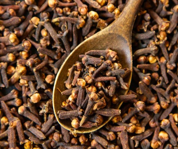 top-view-dried-cloves-with-wooden-spoon-scaled-1.jpg